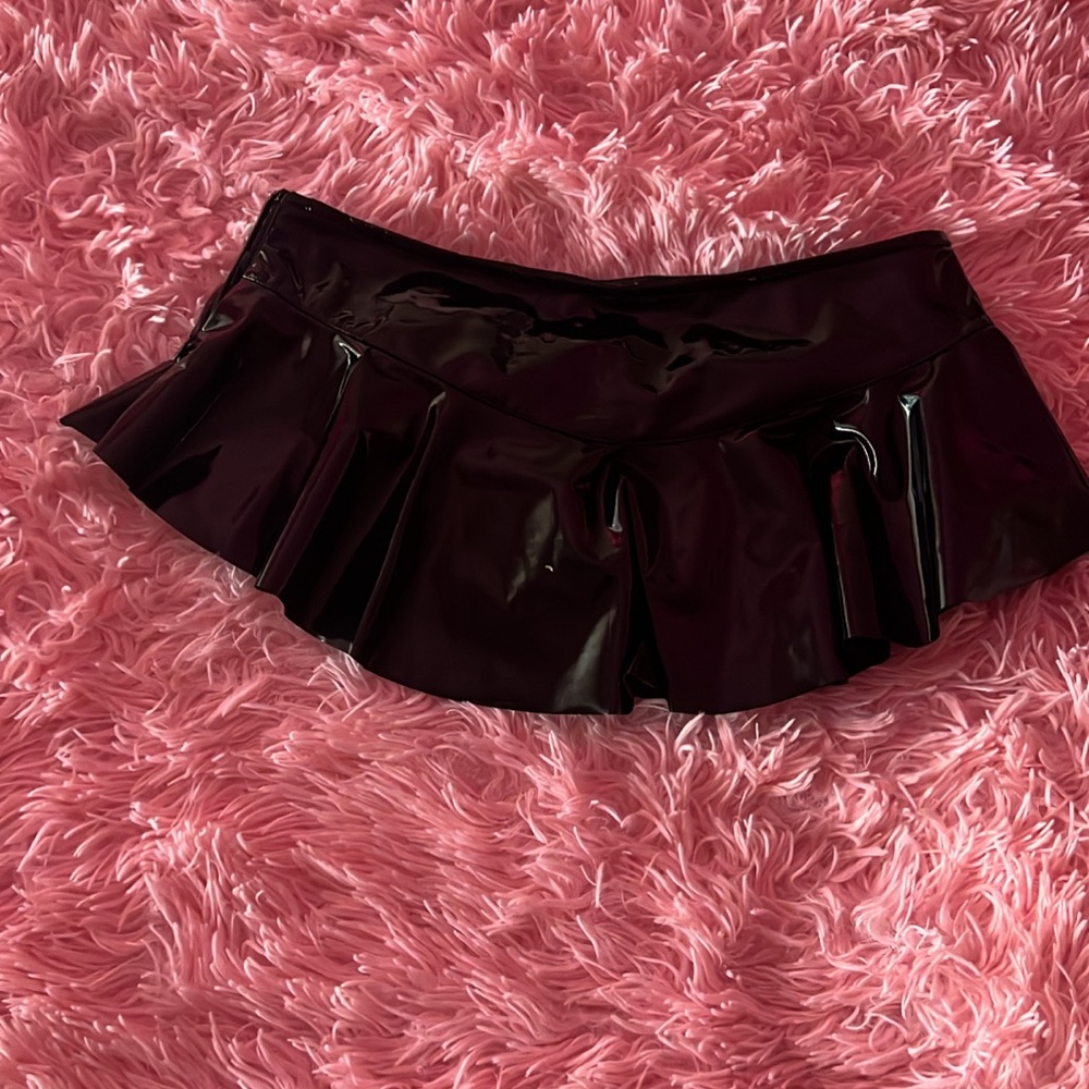 Never worn Black latex mini skirt with built in shorts